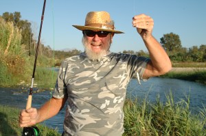 Norman´s first fly-caught fish. Things can only get better!