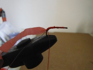 Tie in a narrow strip cut from a plastic bag