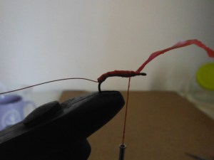 Wrap the plastic strip forward and tie down