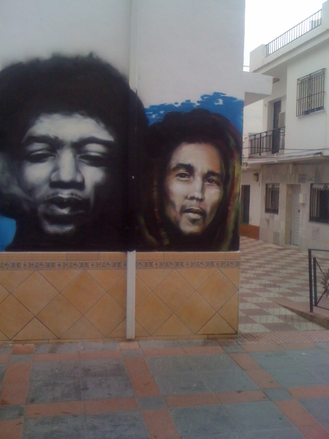 A striking mural of Hendrix and Bob Marley