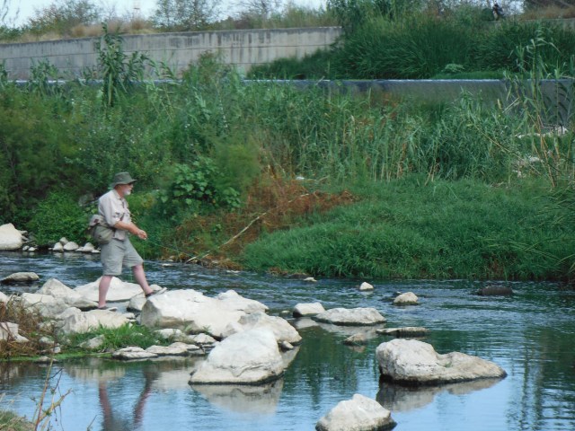 Paul M fishing where the fast water enters a pool.