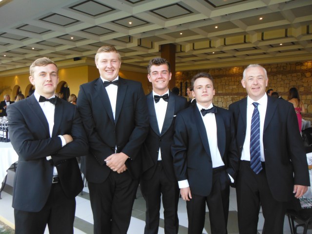These fellas have just graduated from school. Here we are again all dressed up at the graduation dinner last month.