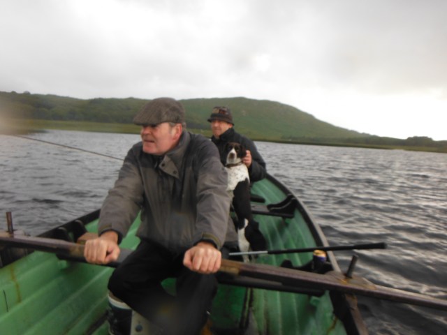 Look at these mean ugly fishermen. You think a squall will deter them? 