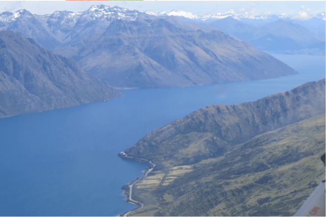  Passing over the Remarkables  Halfway Bay comes into view